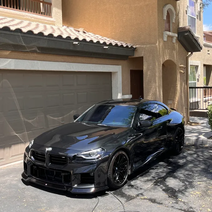 Black BMW M2 with a flawless glossy finish