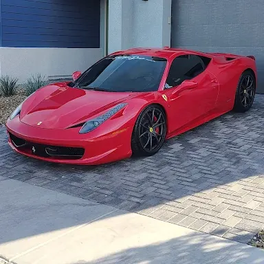 Red Ferrari 458 with a deep glossy finish