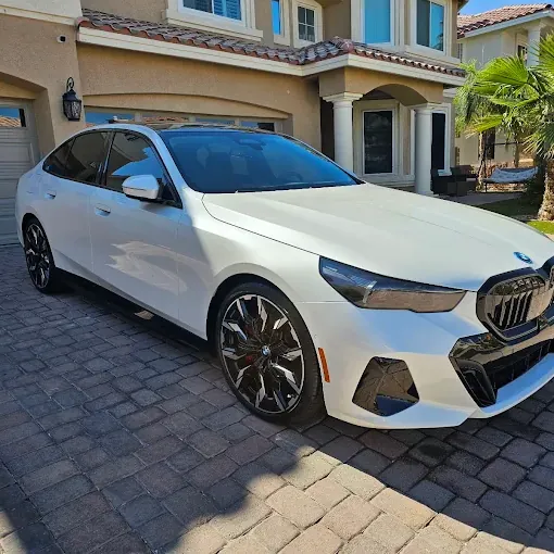 White BMW i5 cleaned inside and out